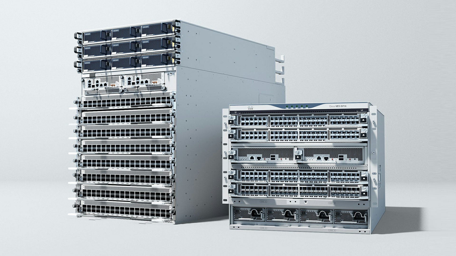 Person typing on a laptop in a dark room